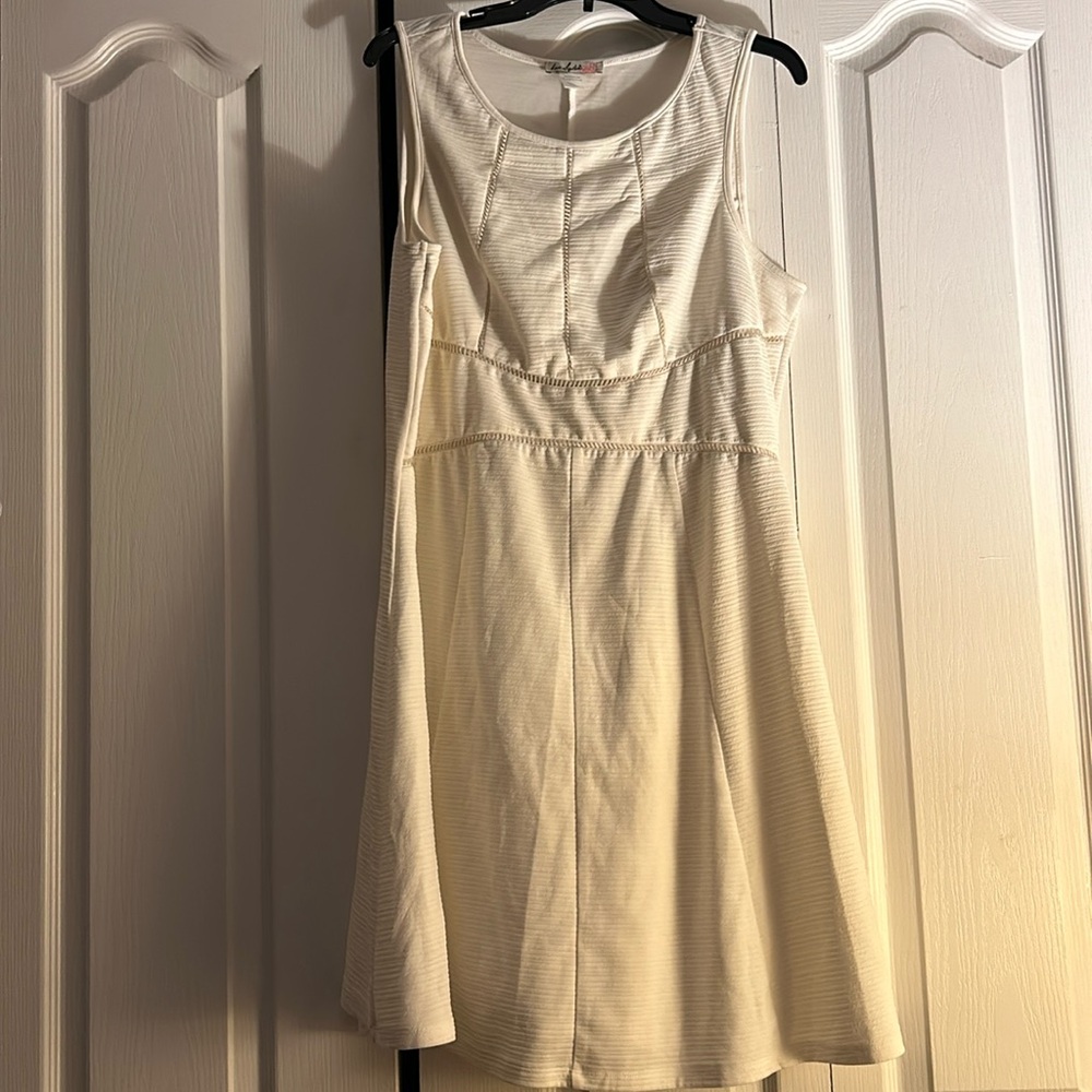 Women’s off white sleeveless dress